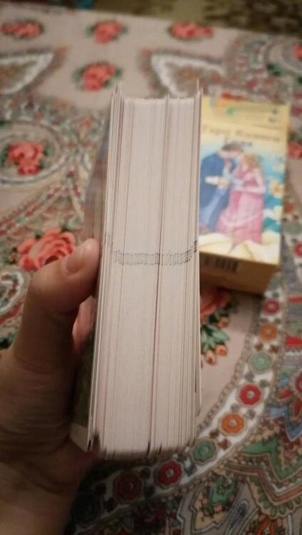 Фотография книги "Каратти: Таро "Колесо Года", на русском языке"