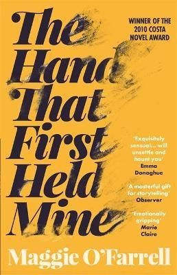 Обложка книги "The Hand That First Held Mine"